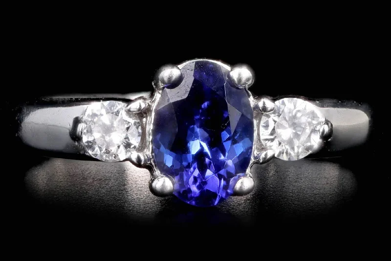 14K White Gold .80 Carat Oval Tanzanite & Diamond Ring