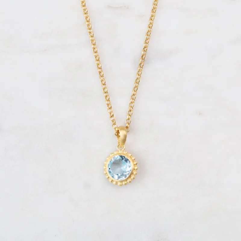 Karma Blue Topaz Pendant Necklace